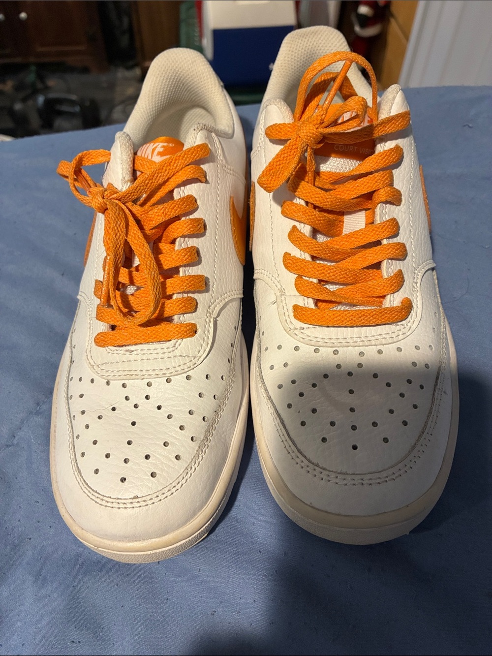 Nike Unisex White Leather Sneakers with Orange Laces and Swoosh